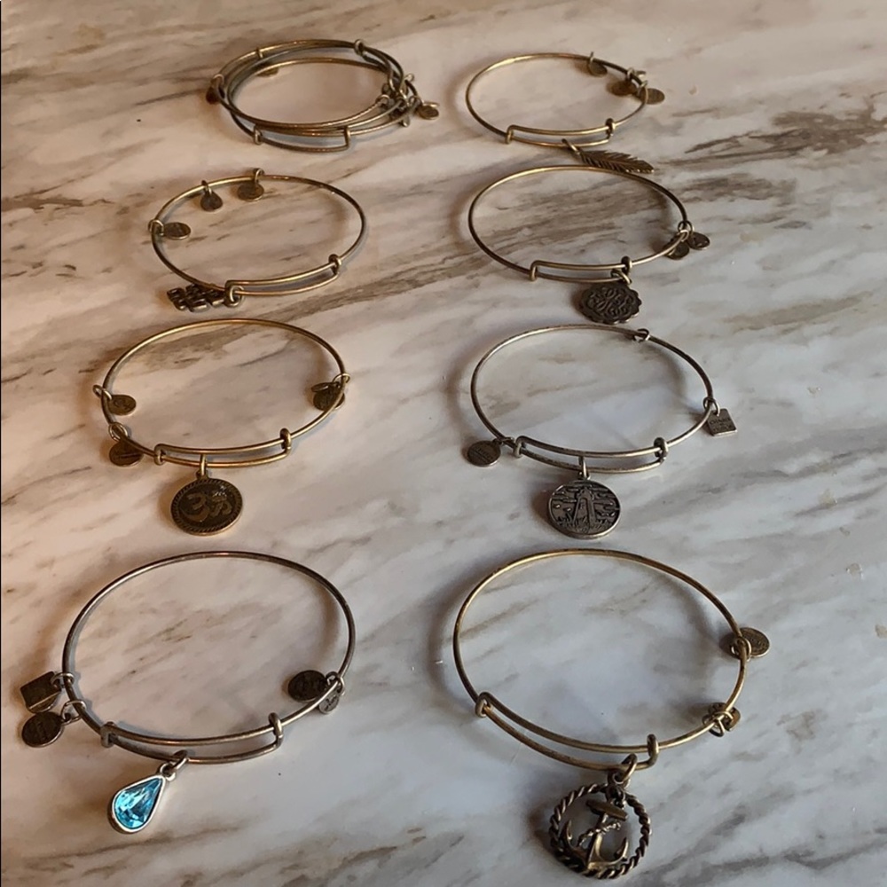 10 Alex and Ani Bangles.